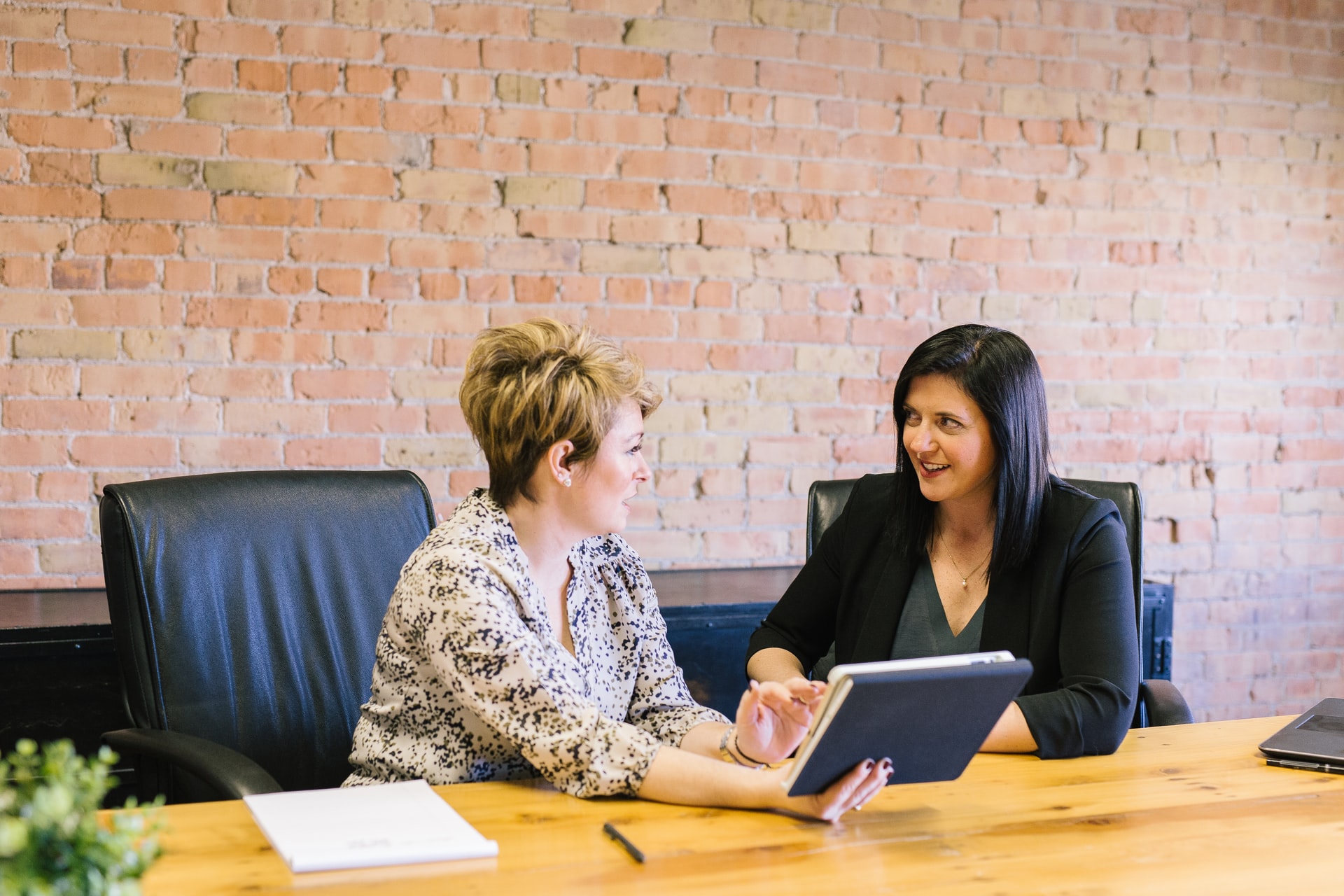 Attorney Michelle Nabati listening compassionately to a client during a consultation